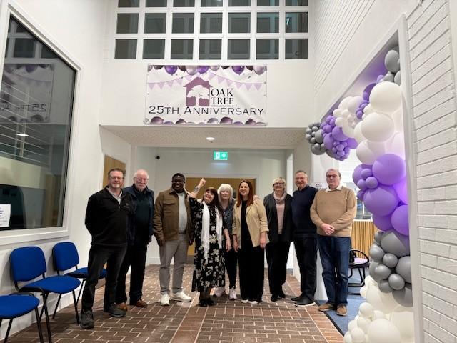 OTHA Committee Members standing in the office